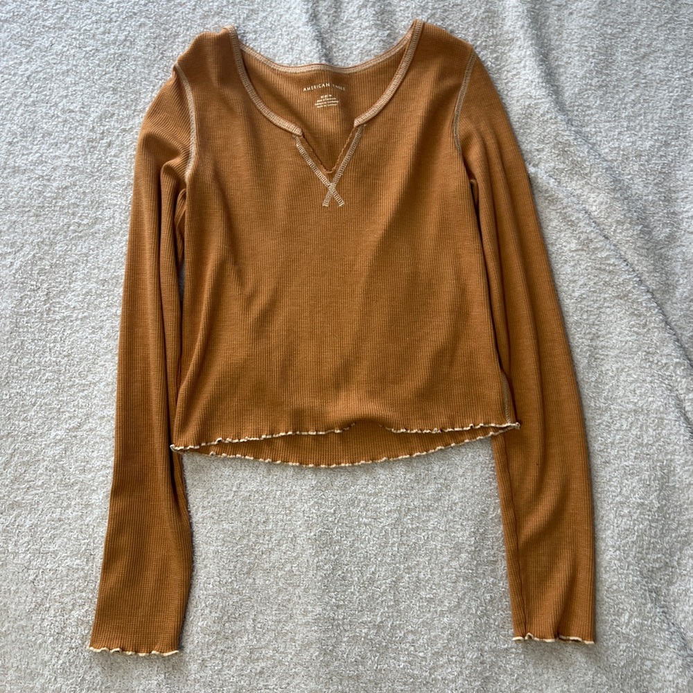 American eagle long sleeve with ruffles. Never worn.